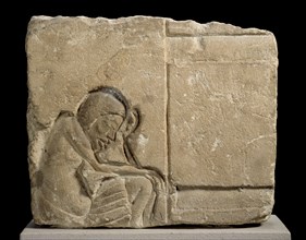 Limestone fragment carved relief of sleepy servant, XVIIIth Dynasty, c1540-c1292BC. Artist: Unknown.