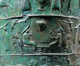 Scene from a situla in bronze of the Certusa of Bologna with a character playing the harp and ano?