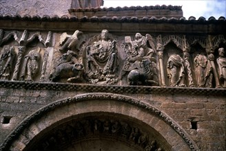 Romanesque façade of the Church of Santiago in Carrión de los Condes, detail of upper frieze with?