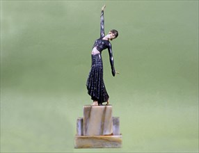 Dancer, mounted on ivory, metal and marble base.