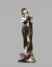Figure representing a priestess, mounted in bronze and ivory, work by Marquet.