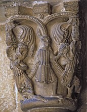 Capital decorated with the Good Shepherd with two figures on each side carrying a lamb and wolves?