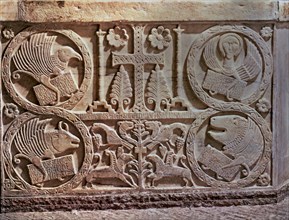 Bas-relief from the Baptistery of Saint Calixto (737-756). Detail of stucco with the symbols of t?