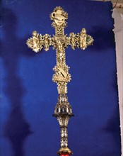 'Processional Cross' (front). Silver gilt and enamelled with sculptural applications, enamel pla?