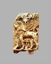 Ivory plaque with the representation of a sphinx.