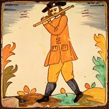 Tiles of the Palmita series, flute musician.
