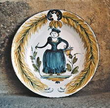 Dish with a woman figure, from Sargadelos.