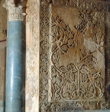 Detail of a column, a capital and the wall of the Hall of Ambassadors in Medina Azahara, built by?