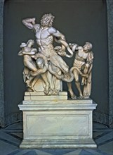 Laocoon. Sculptural group representing the Trojan priest and his two sons strangled by snakes..