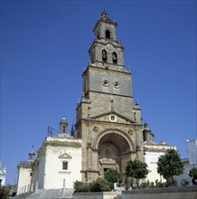 Façade and tower of the Church of Santa Maria de la Asunción in Utrera (Sevilla) .