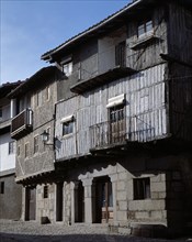 Street of La Alberca (Salamanca), and a house façade.