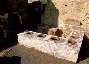 Termopolio ruins, hot food shop, located on Cardo V street, located on the ruins of Herculaneum.