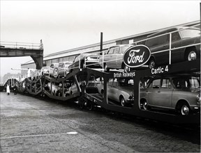 Train carrying cars of the Ford trademark, 1950.