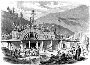 The opening of the Alps, placing the last stone in the Mont - Genís entrance tunnel between Franc?