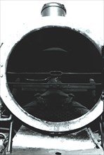Engine of a steam train, inside of the smoke box.