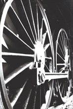 Axle wheels of a steam train engine.