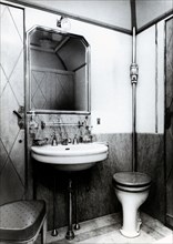 Toilet cabin in an Italian wagon train, 1950.