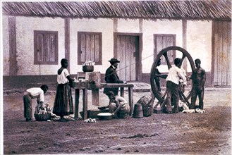The cassava mill, work in a farming plantation with slaves, lithograph.