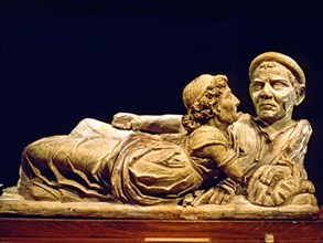 Etruscan sarcophagus in terracotta with the image of the deceased.