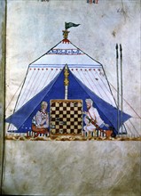 Moor and Christian playing chess inside a tent. Miniature in the 'Book of the games, chess, dice ?
