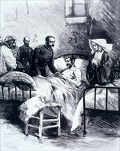 Alphonse XII during a visit at a cholera hospital at Aranjuez.
