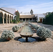 View of one of the 14 courtyards inside the Palace of Viana in Cordoba.