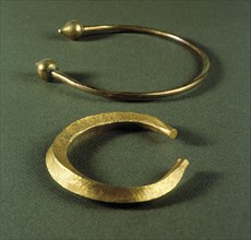 Celtic jewelry, gold bracelet and necklace.