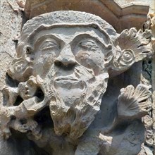 Head of man with beard, detail of a capital of the cloister of the Monastery of Santes Creus.