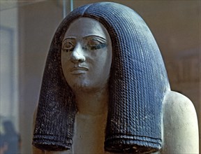 Female statue from the Tomb of SEPA, chief of the southern army, held in polychromed limestone.