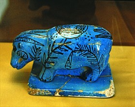 Hippo, blue glazed ceramic figurine, side view.