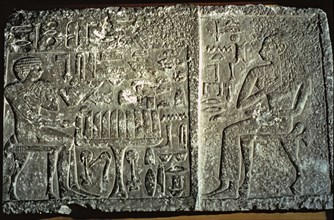 Engravings on a gravestone from the Giza Necropolis.