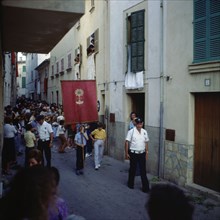 Procession of Corpus' which is celebrated every year and runs through the narrow streets of the t?