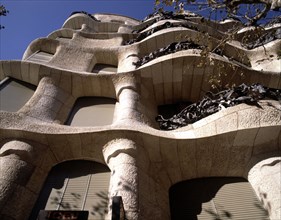 La Pedrera or Mila House, completed in 1912, detail of the stone blocks of the façade seen from b?