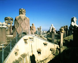 View of the roof of La Pedrera or Mila House with chimneys, designed by Antonio Gaudi.