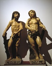 'Adam and Eve', polychromed stone carving.