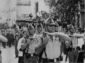 The Spanish Legion. Parade and Procession of Christ of the Good Death in Malaga, carried on a pla?