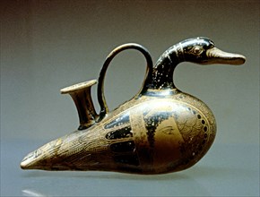 Ceramic baby bottle decorated as a duck, made in terracotta.
