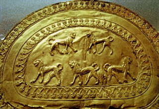 Etruscan gold fibula decorated with five lions, from the Regolini Galassi tomb.