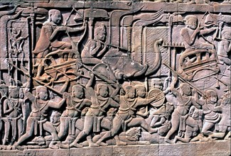 Bas-relief showing scenes of a battle in the ruins of Angkor Thom.