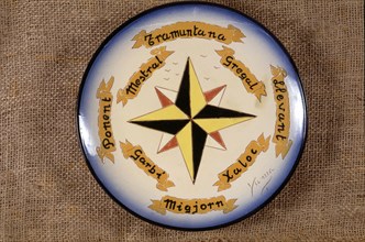 Compass rose, in a ceramic plate.