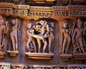 Reliefs with erotic scenes in the Lakshmana Temple, Kajuraho, India..