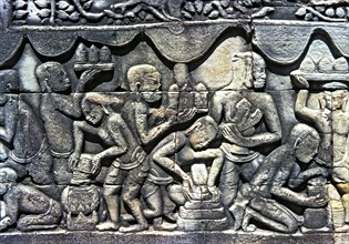 Relief showing an everyday scene in the temples of Angkor Thom in Cambodia.