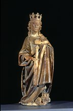 Figure holding the book that contains the epitaph, sculpture from the tomb of Bishop Bernat de Pa?