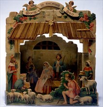 Die-cut nativity scene used as a Christmas card.