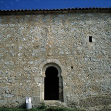 Detail of the front door with a horseshoe arch of the chapel of San Baudelio de Berlanga.
