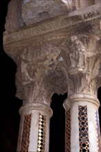 Detail of two inlaid mosaic capitals and columns of the Monreale Cathedral cloister in Sicily, No?