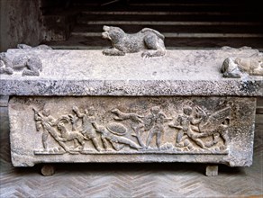 Etruscan stone sarcophagus with reliefs of Eastern influence.