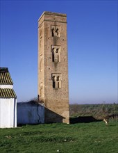 View of the brick square tower of the Cuatrovitas chapel, old Almohad mosque in Bollullos de la M?