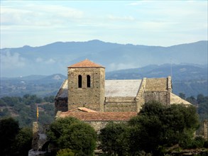 Monastery of Sant Pere de Casserres with the bell tower in the foreground.