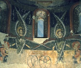 Detail of two angels of the mural in the apse of the church of Santa Maria d'Aneu in Pallars Jussà.